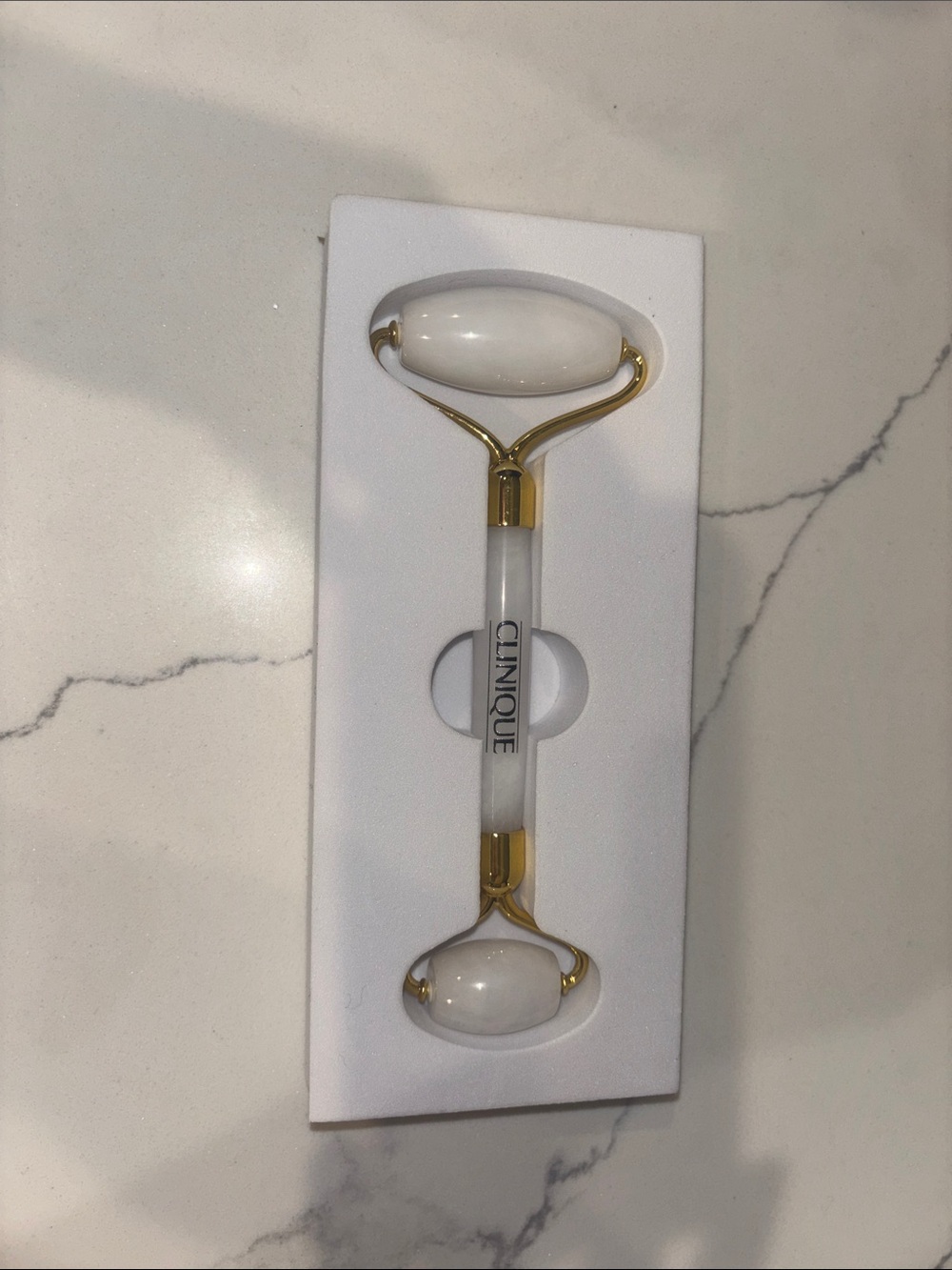 Clinique White and Gold Facial Massage Roller